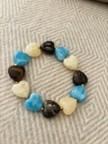 Armband hartjes blauw/bruin/crème