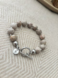 Armband beige gemêleerd