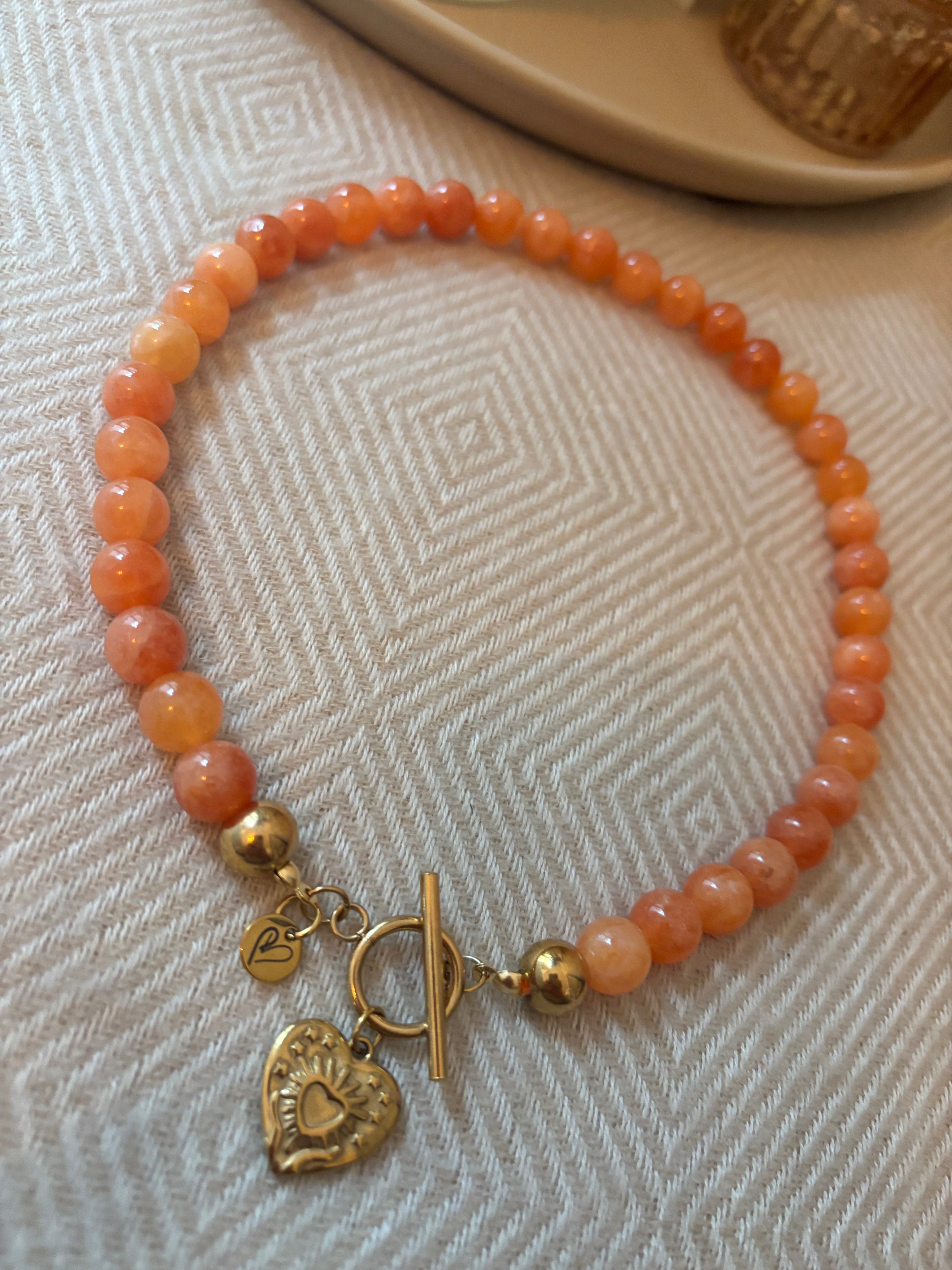 Ketting oranje met bedel